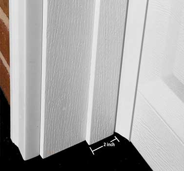 Close-up illustration of a garage door side weather seal from the original article